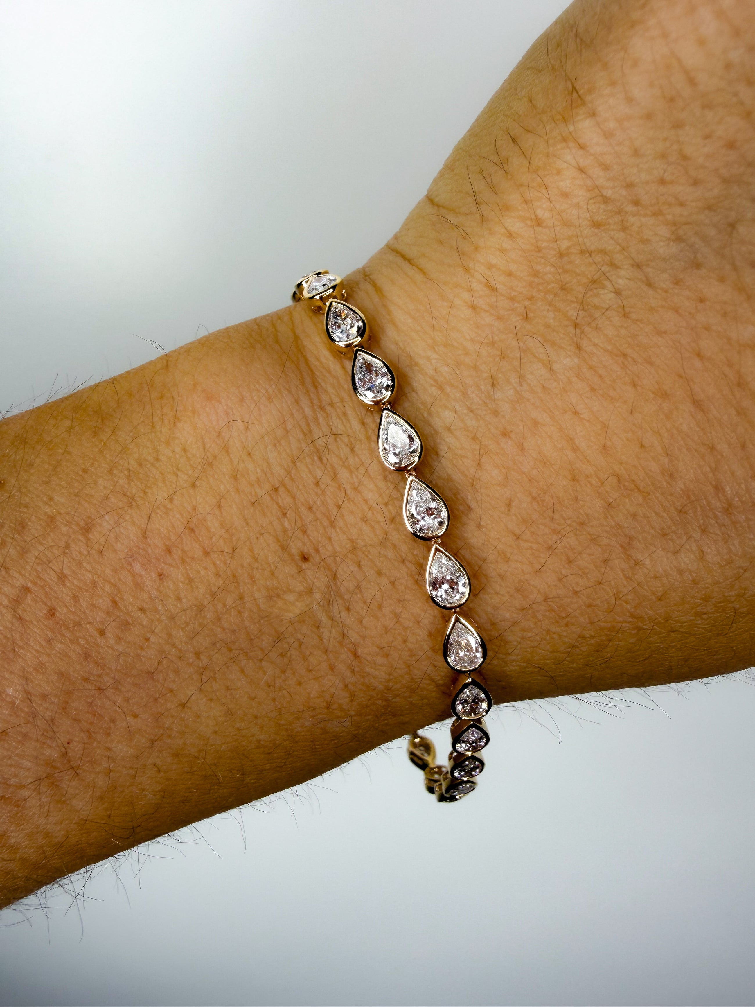 Pear Bezel Emerald Tennis Bracelet