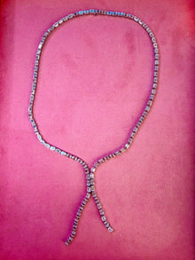 The Iconic Emerald Lariat