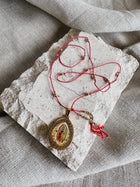 Virgin Mary on Silk Necklace