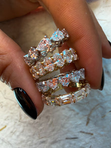 The Iconic Horizontal Emerald Eternity Band