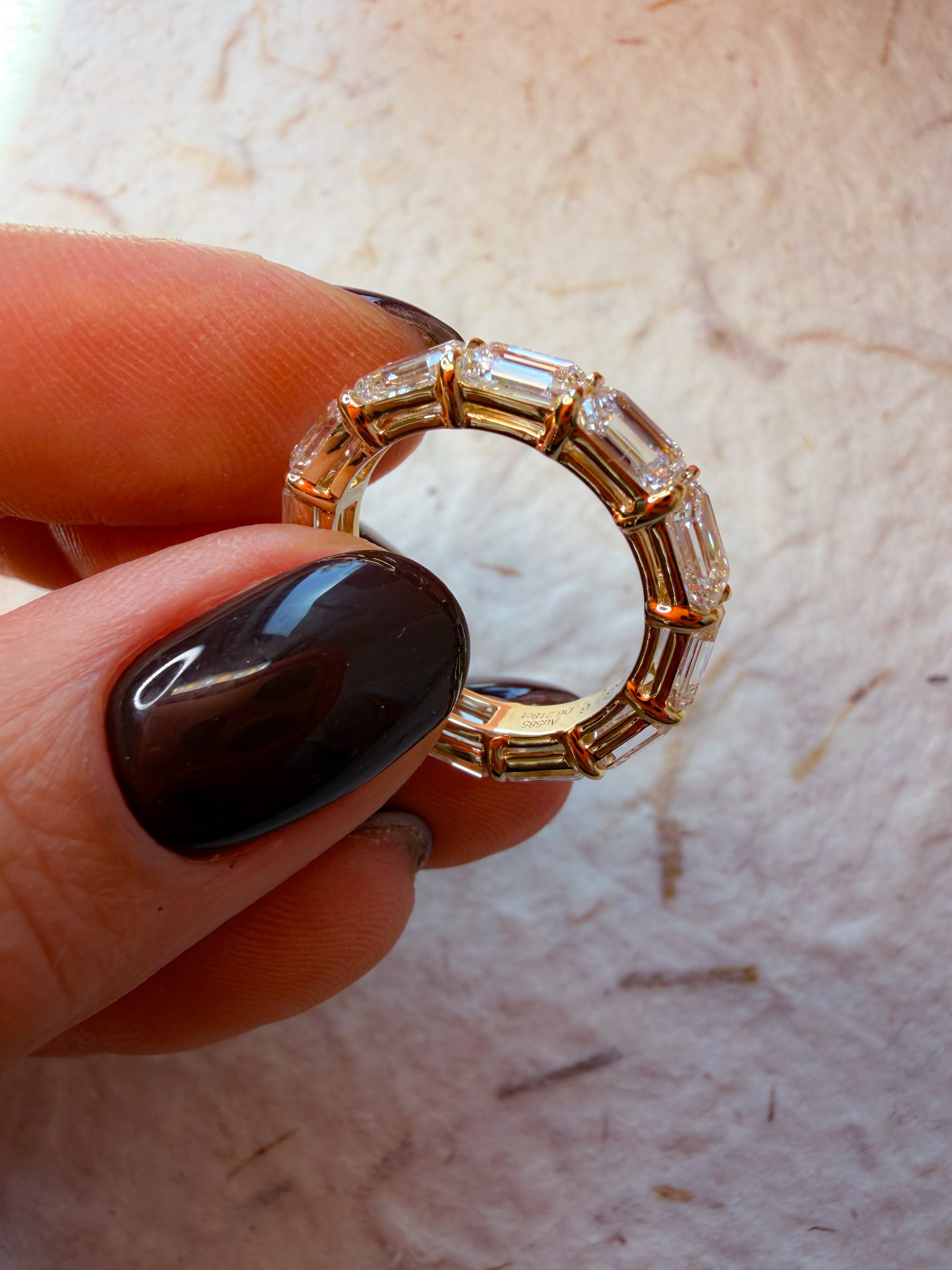 The Iconic Horizontal Emerald Eternity Band