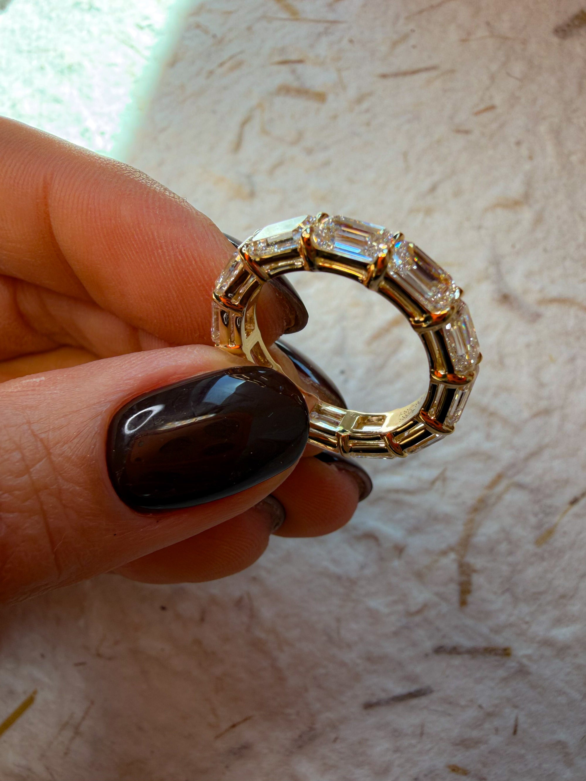 The Iconic Horizontal Emerald Eternity Band