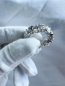 The Alternating Pear Diamond Eternity Band