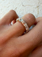 The Iconic Horizontal Emerald Eternity Band