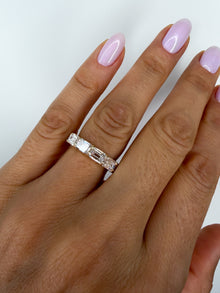 The Iconic Horizontal Emerald Eternity Band