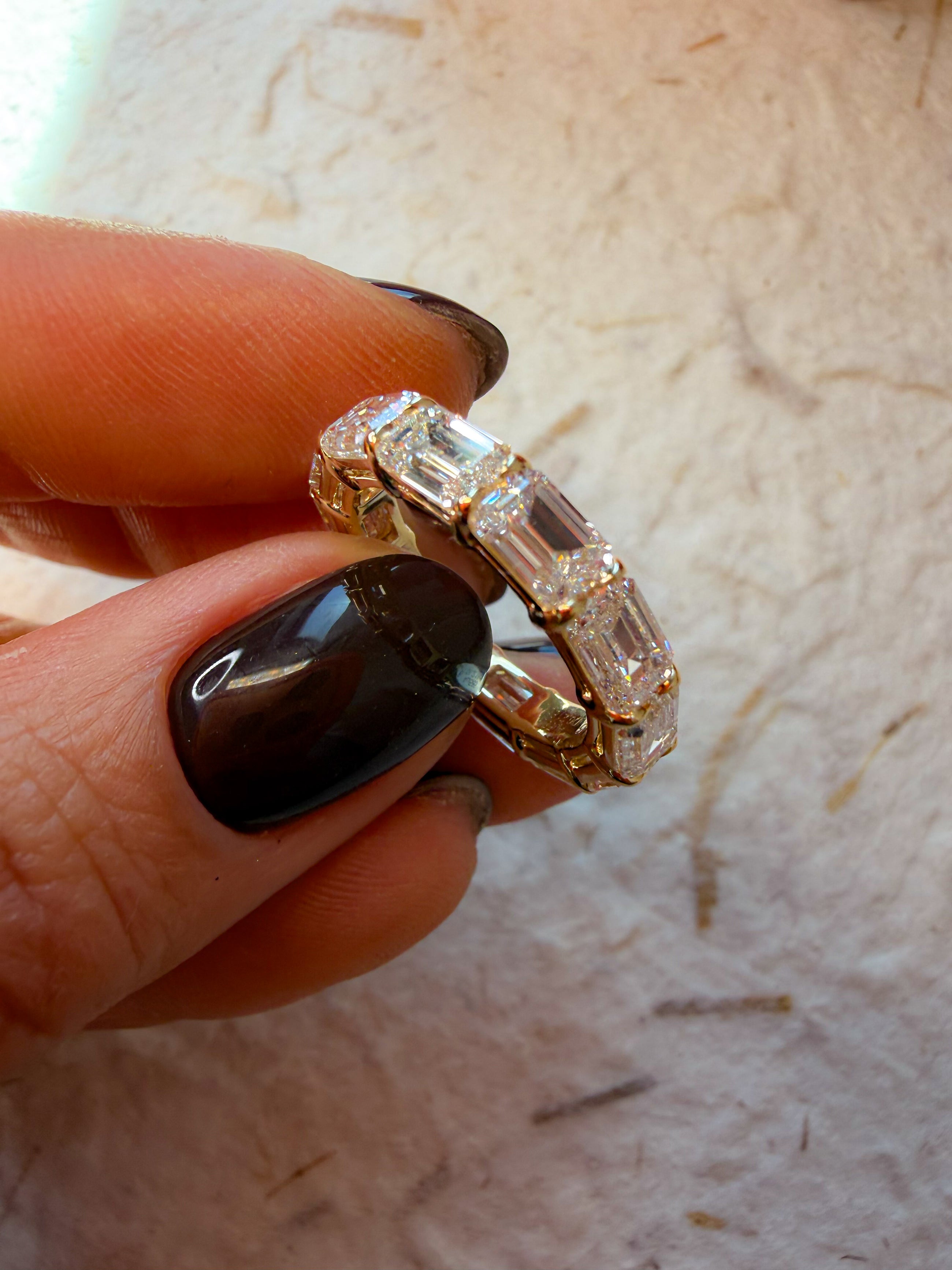 The Iconic Horizontal Emerald Eternity Band