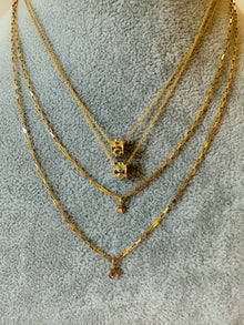 The Emerald Charm Necklace