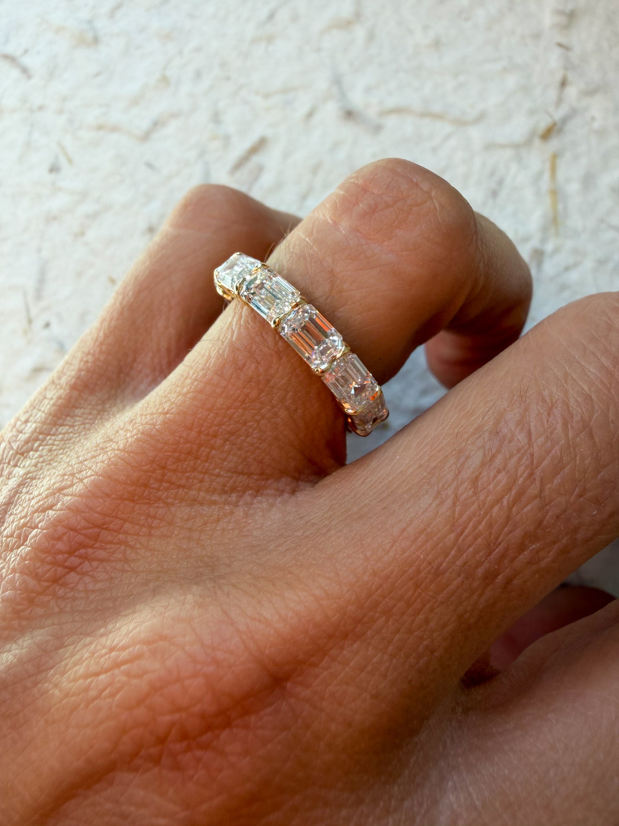 The Iconic Horizontal Emerald Eternity Band