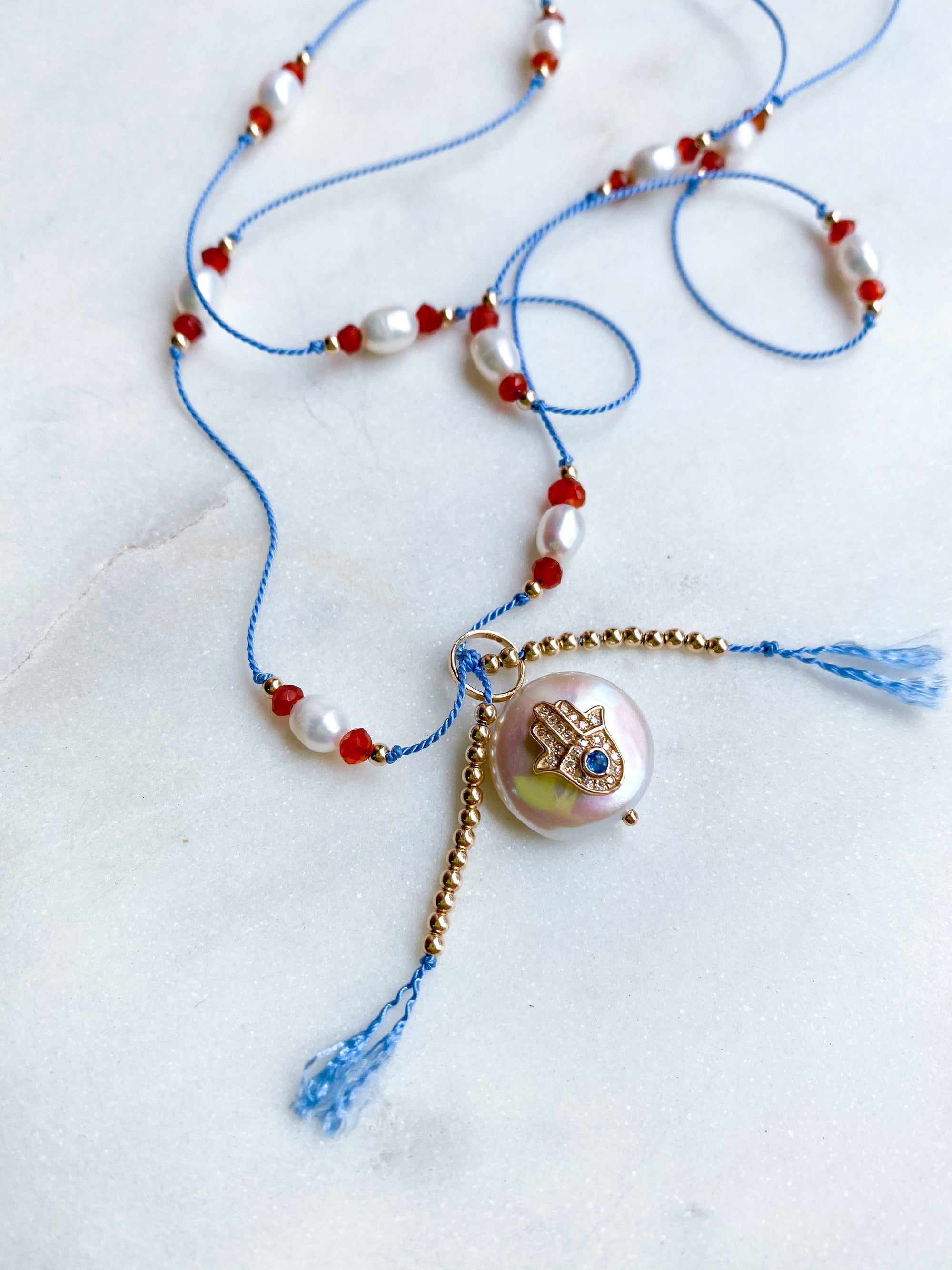 Blue Sapphire Diamond Hamsa Pearl on Silk Necklace