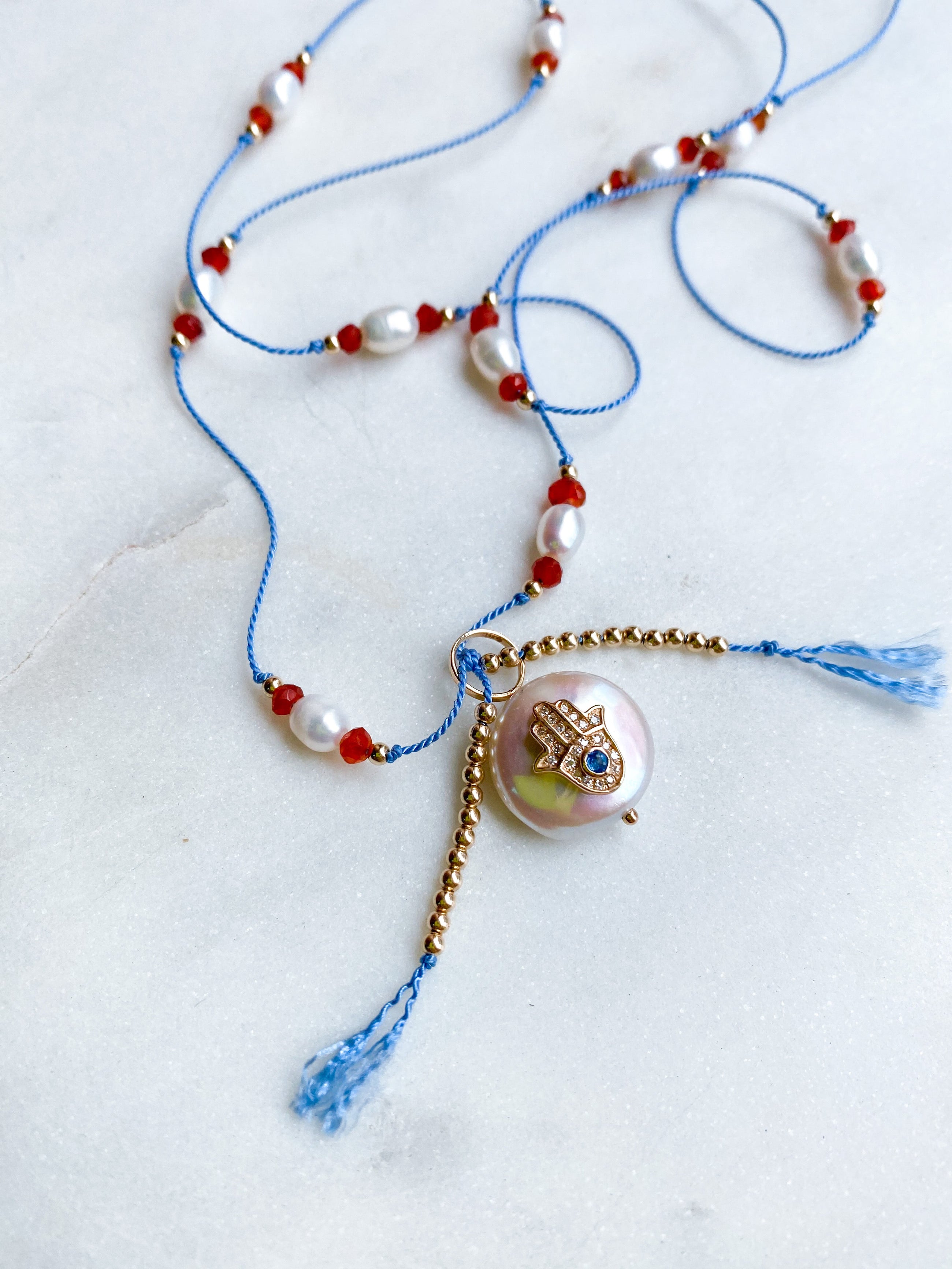 Blue Sapphire Diamond Hamsa Pearl on Silk Necklace