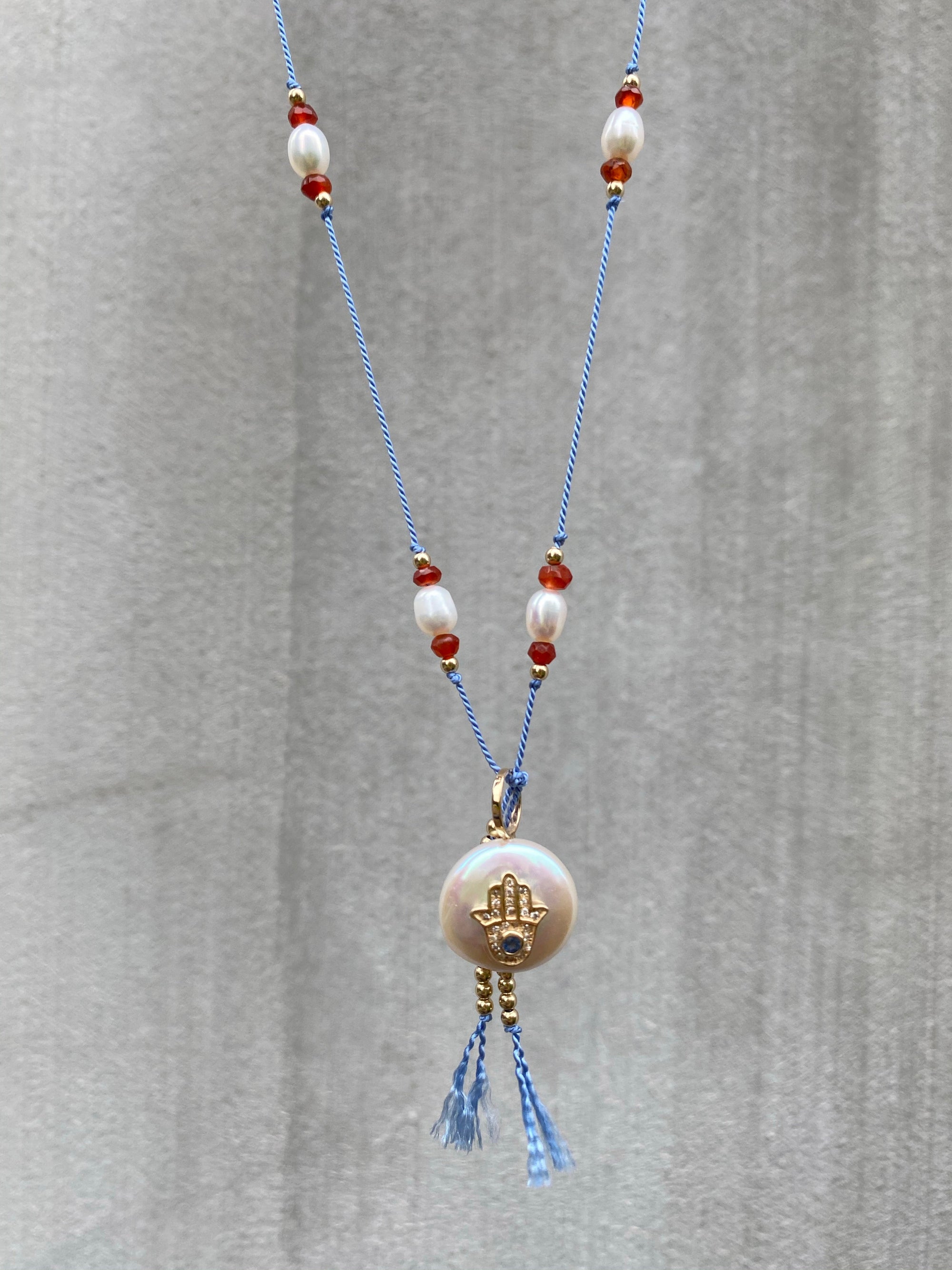 Blue Sapphire Diamond Hamsa Pearl on Silk Necklace
